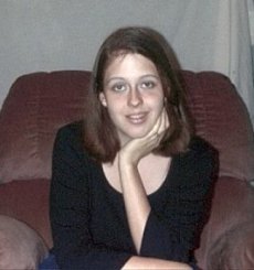 Me posing in Chris's recliner March 2002